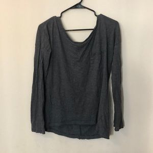 Small dark gray long sleeve shirt